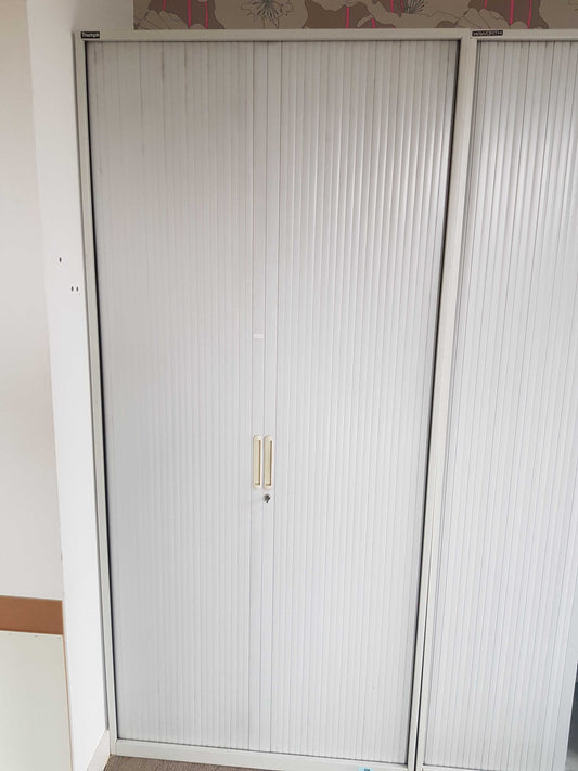 Used Tall Grey rolling door office cabinet, shelf tambour unit