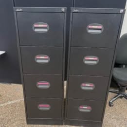2 Used black 4 drawer filing cabinets £75 each cabinet H 132cm D 62cm W 46cm