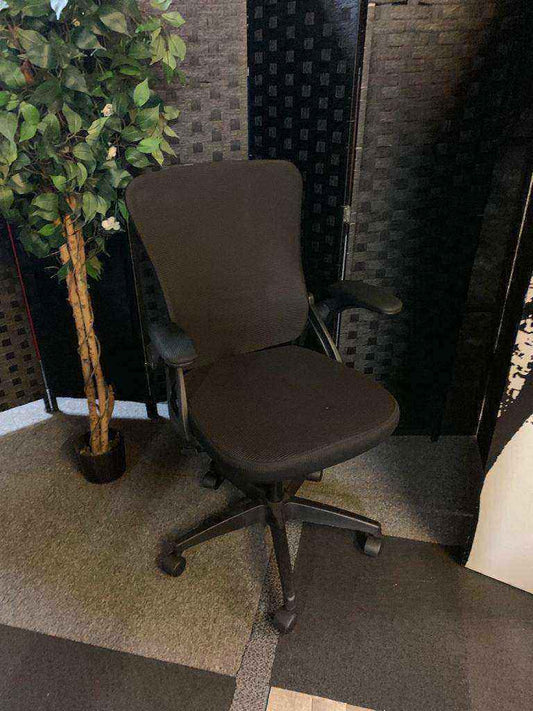 Used adjustable swivel chair Black