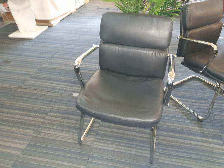 Used faux leather meeting chair Black