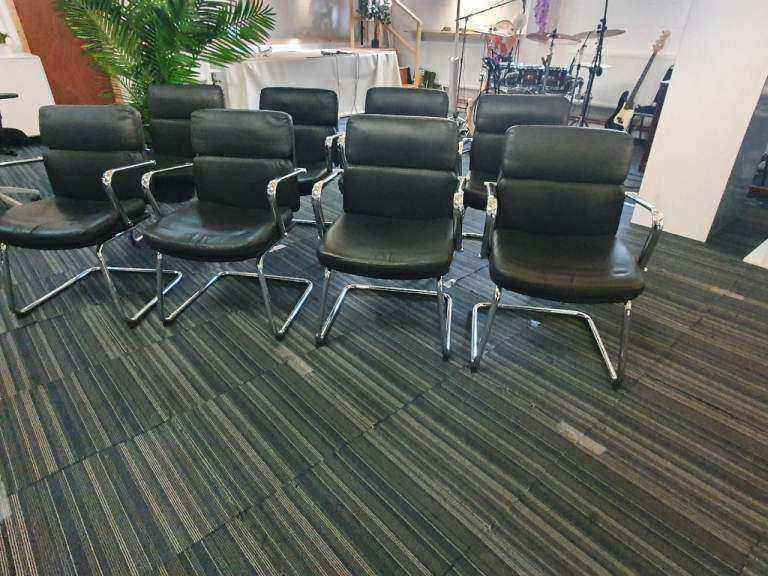 Used faux leather meeting chair Black