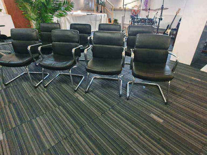 Used faux leather meeting chair Black