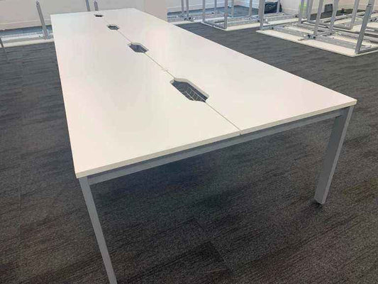 Used white 8 person Pod bank/bench desk with central port cable management 160cm x 80cm per desk