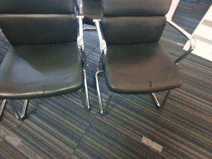 Used faux leather meeting chair Black