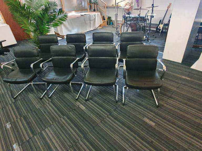 Used faux leather meeting chair Black