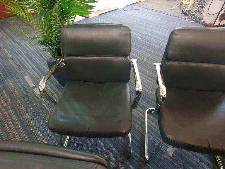 Used faux leather meeting chair Black
