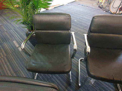 Used faux leather meeting chair Black