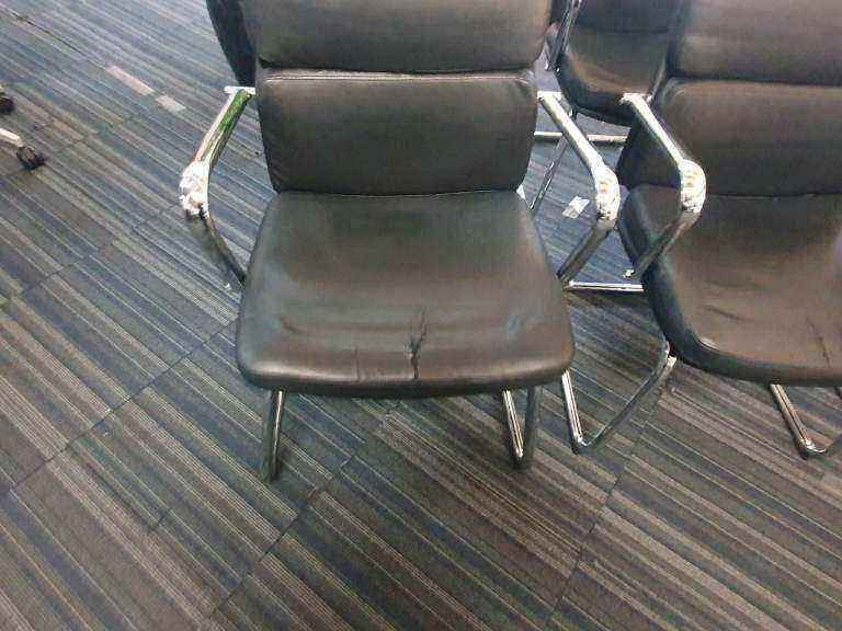 Used faux leather meeting chair Black