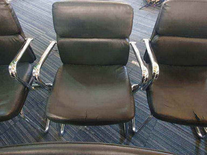 Used faux leather meeting chair Black
