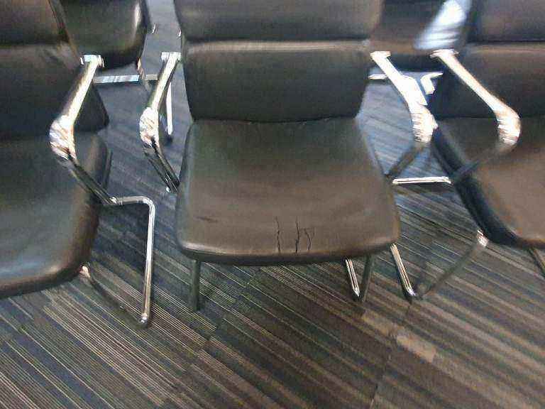 Used faux leather meeting chair Black