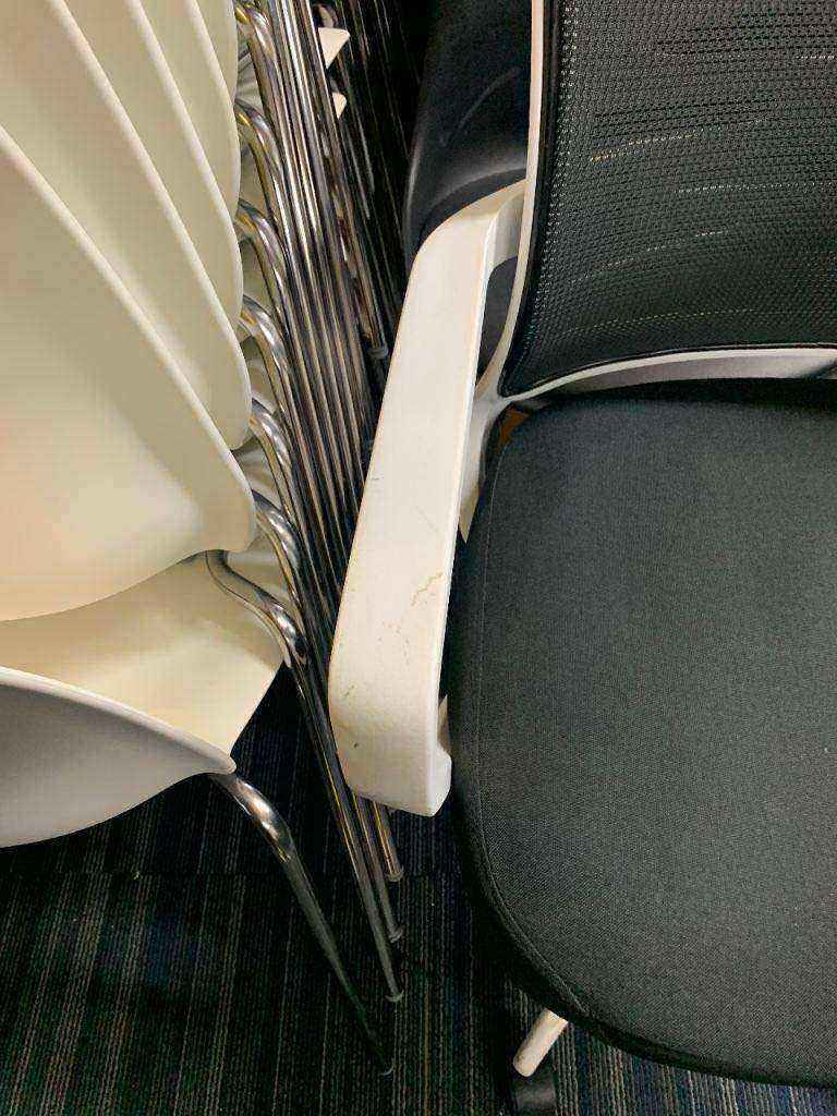 Used adjustable swivel chair Black and white contrast