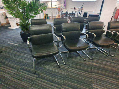 Used faux leather meeting chair Black