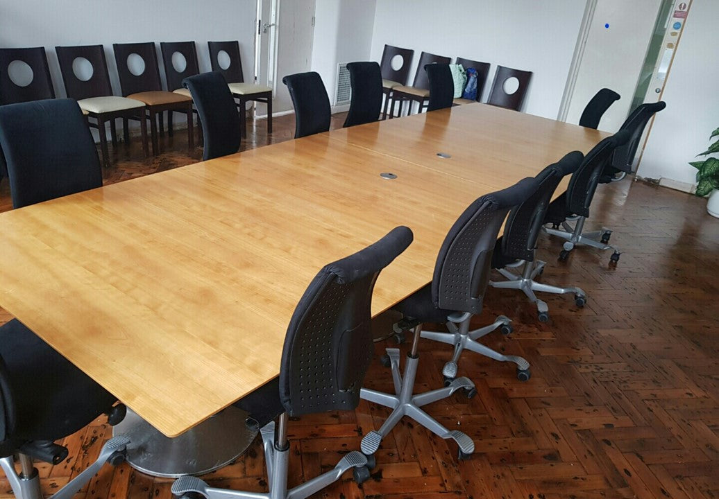 conference table furniture brown table and black chairs