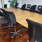 conference room table and chairs in black and brown