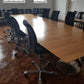 Large brown modular conference room tables