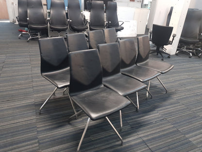 Sixteen Black Office Chairs stick and swivel
