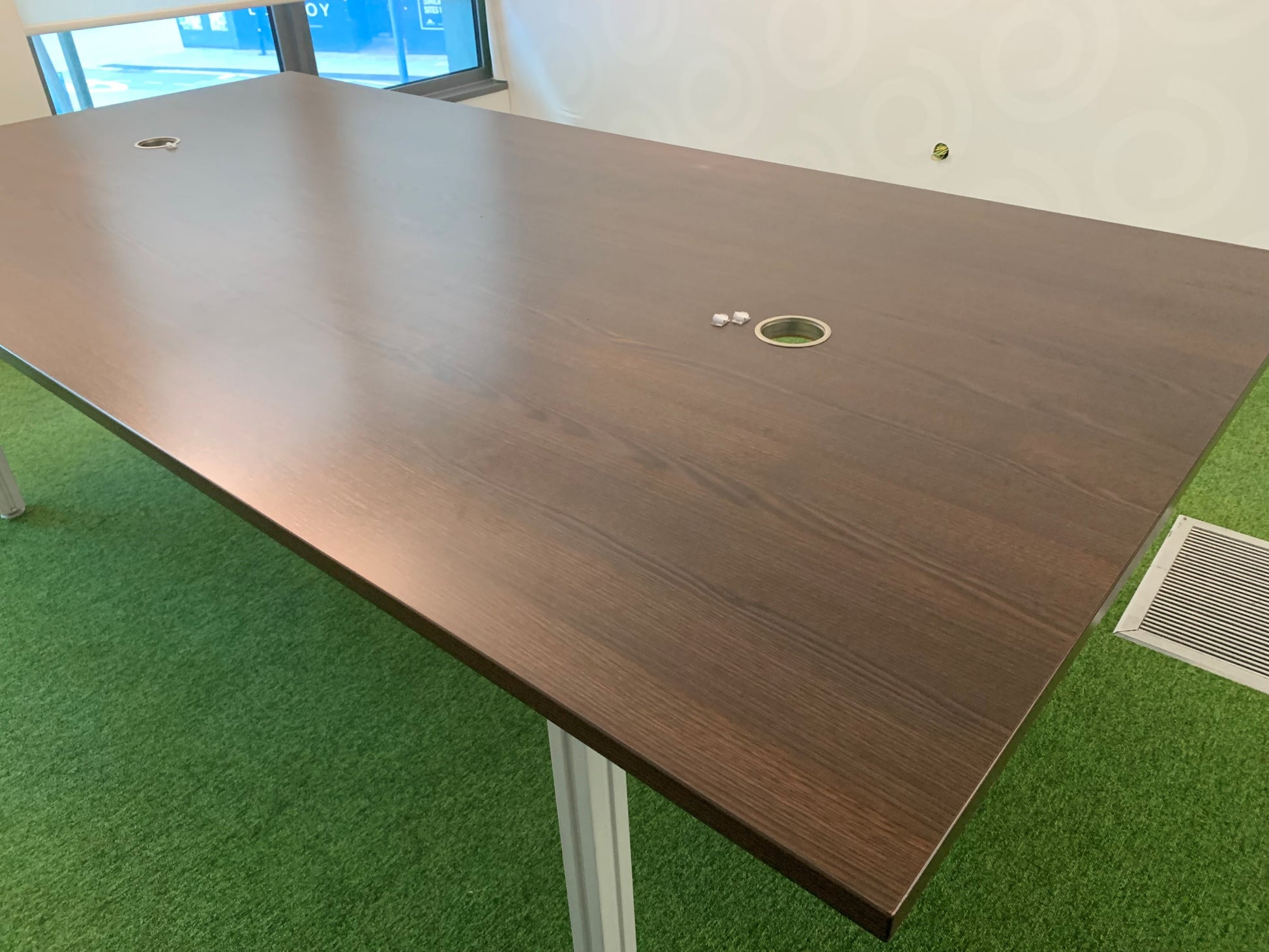 Boardroom table with two cable ports