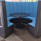 A blue and black office booth