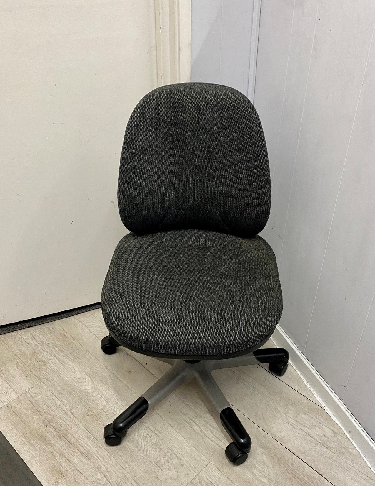 Grey office wheelie chair in dark grey