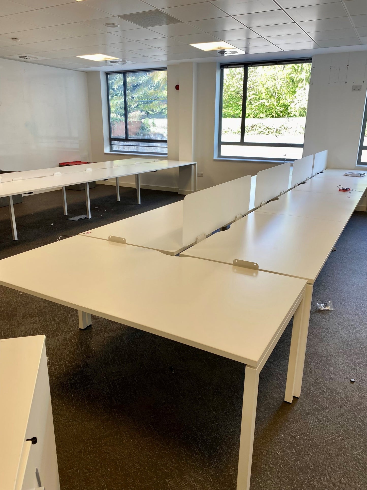 Large multi seater office desk in white with dividers