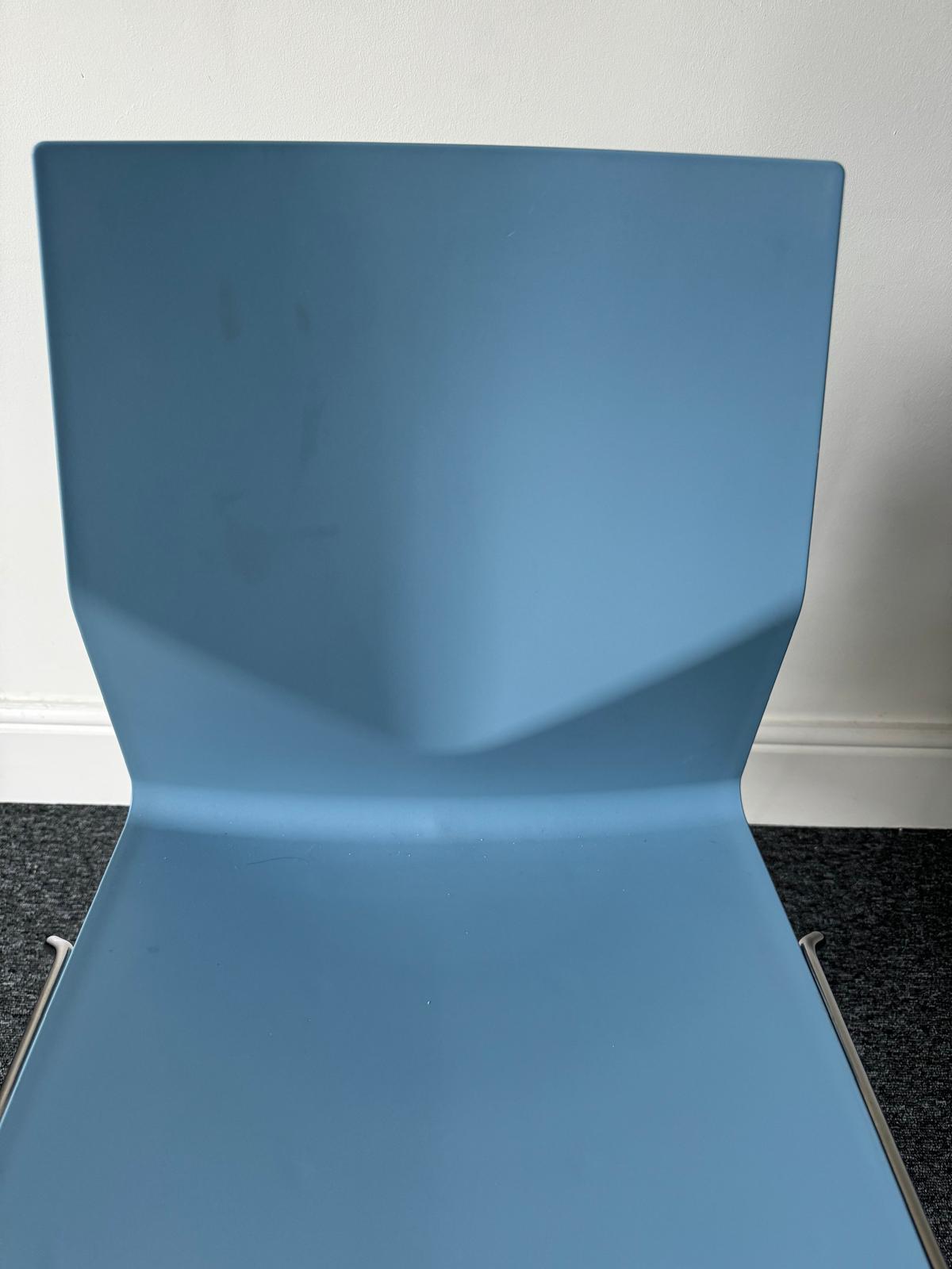 Back of blue conference room chair