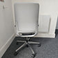 Grey back of swivel office chair