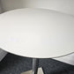 Tabletop on white round podium table