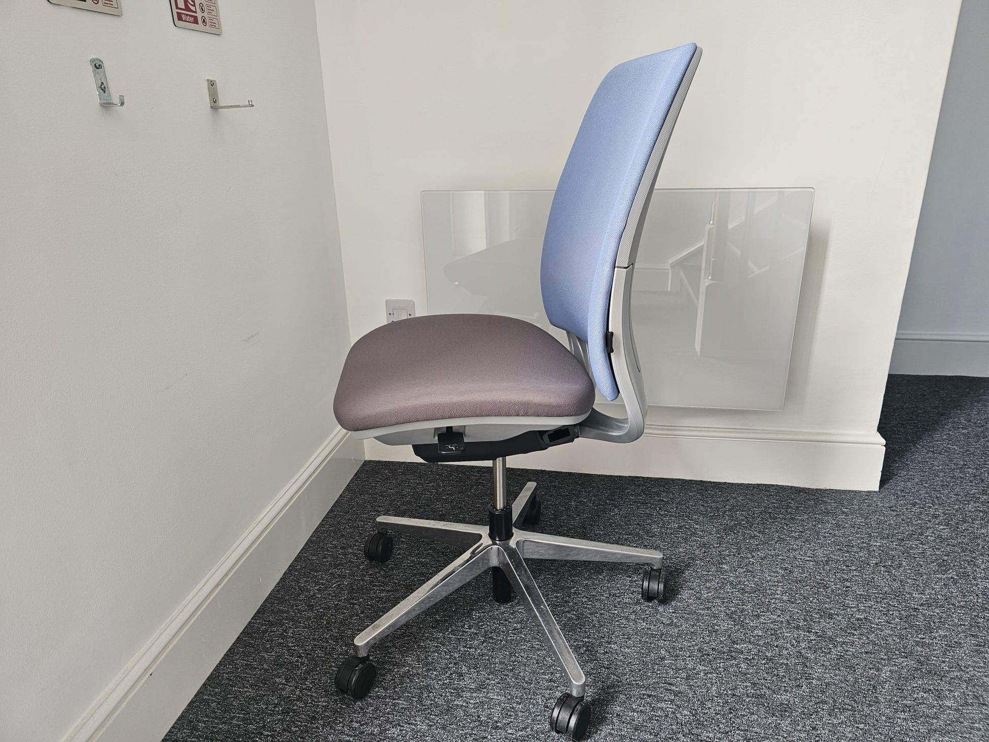 Chrome leg on blue and grey desk chair