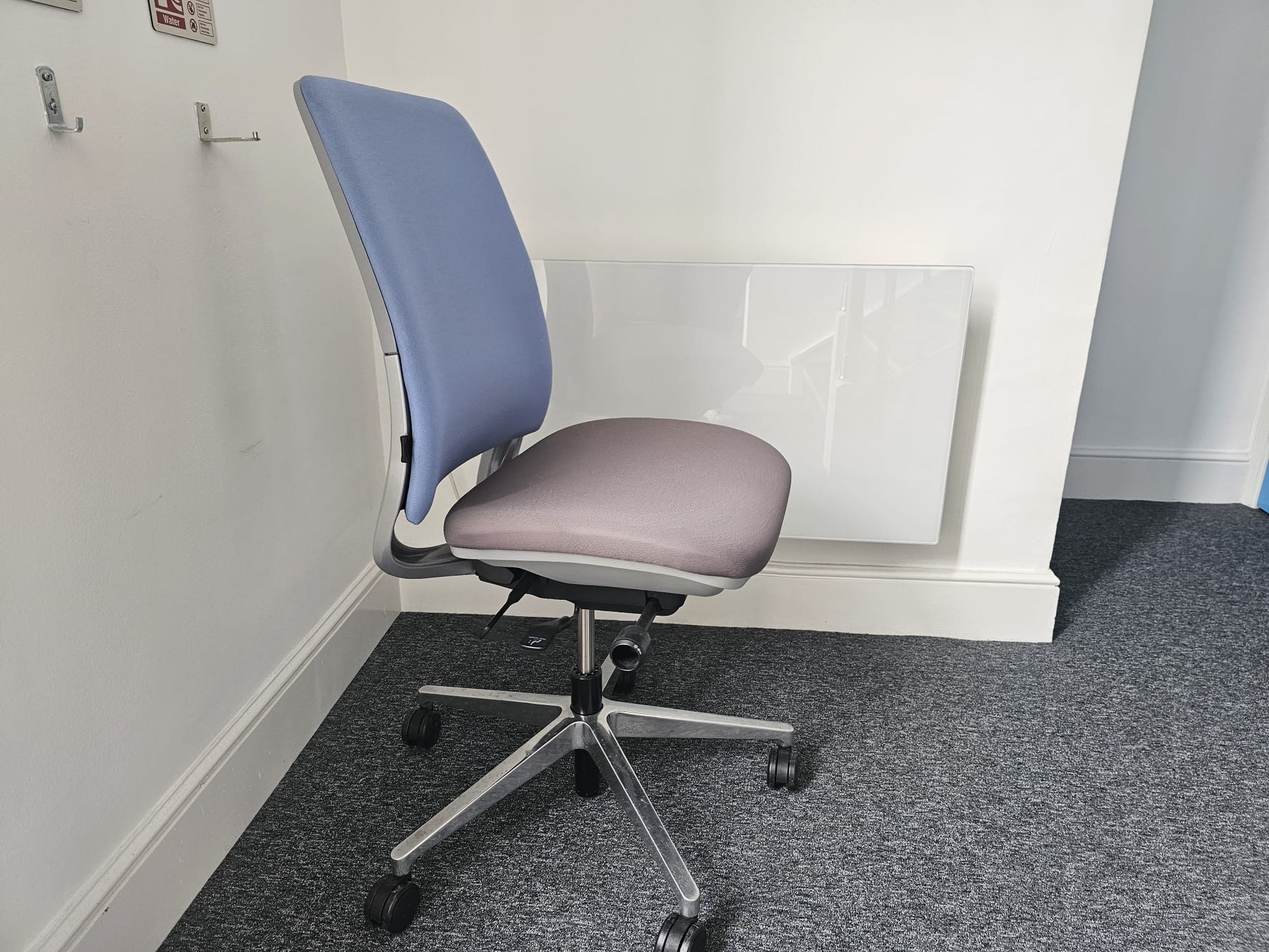 Blue back on office swivel chair