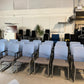 Multiple conference room chairs in blue