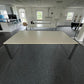 White Meeting Tables in common room