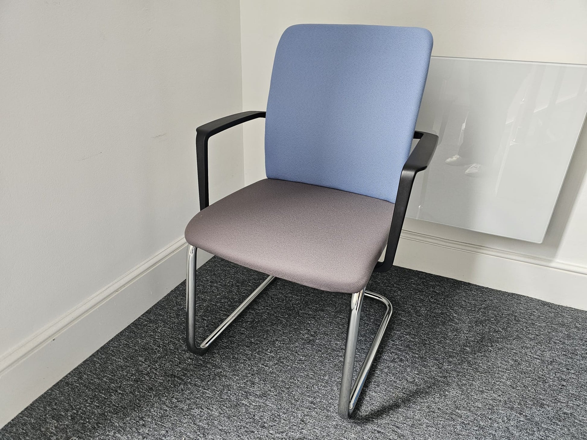 Blue and grey upholstered visitor arm chair