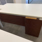 Executive office table with walnut modesty panel and drawers