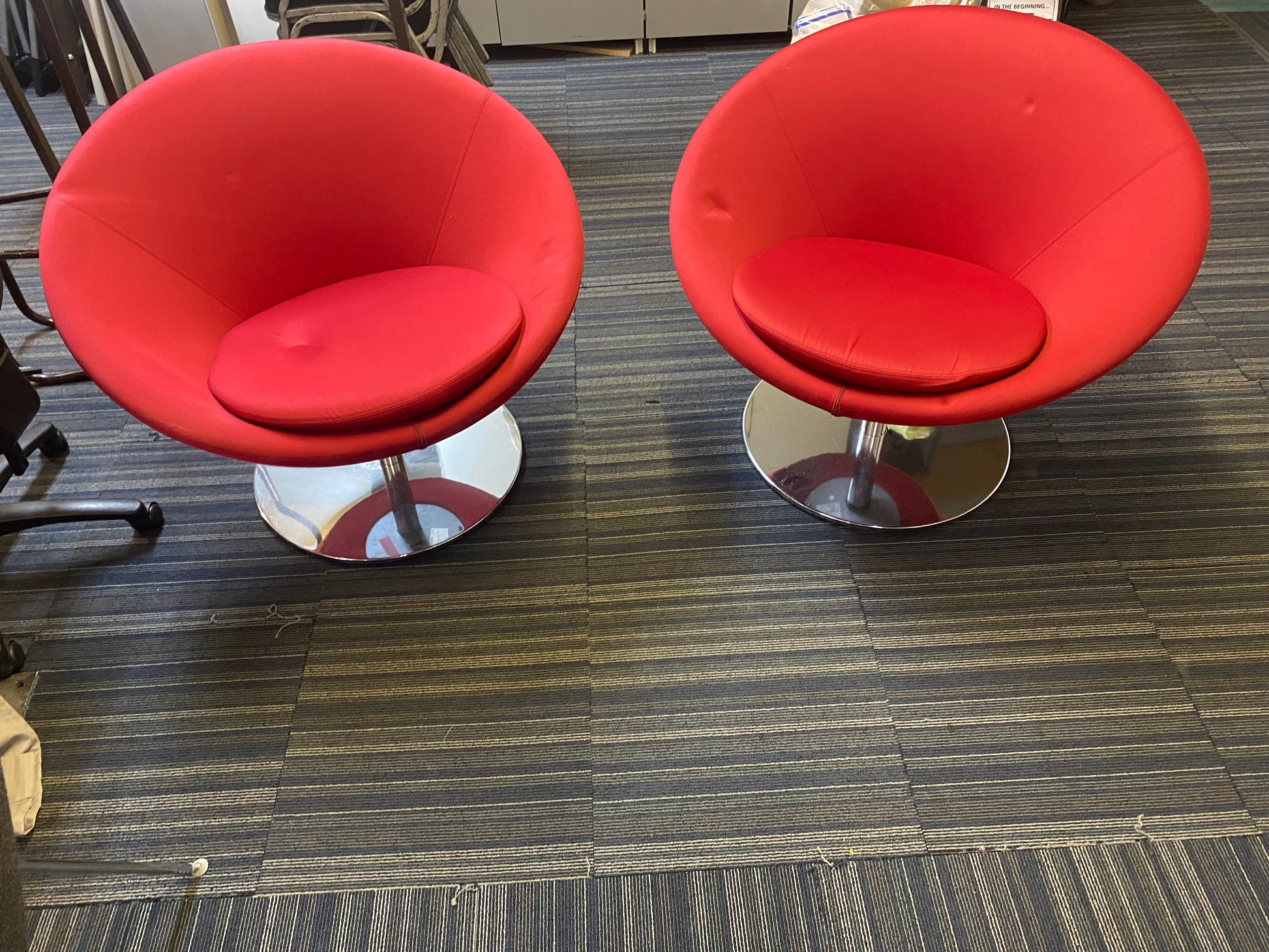 Two Red Globe chair on chrome pedestal base