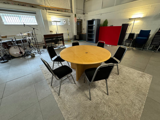 Large round office meeting table