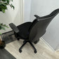 An office chair on wheels in black