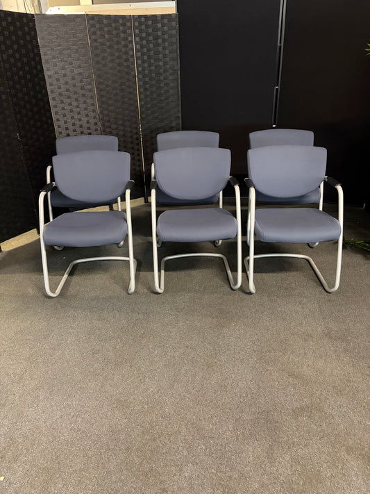 Pre-owned Vitra Vis-a-Vis style meeting chair with cantilever frame and blue fabric