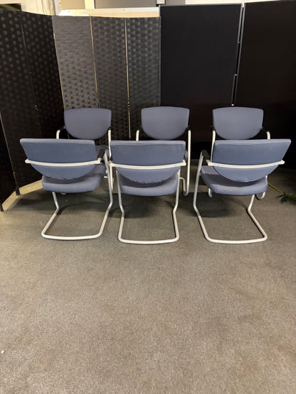 Pre-owned Vitra Vis-a-Vis style meeting chair with cantilever frame and blue fabric