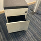 Padded top of white office drawers