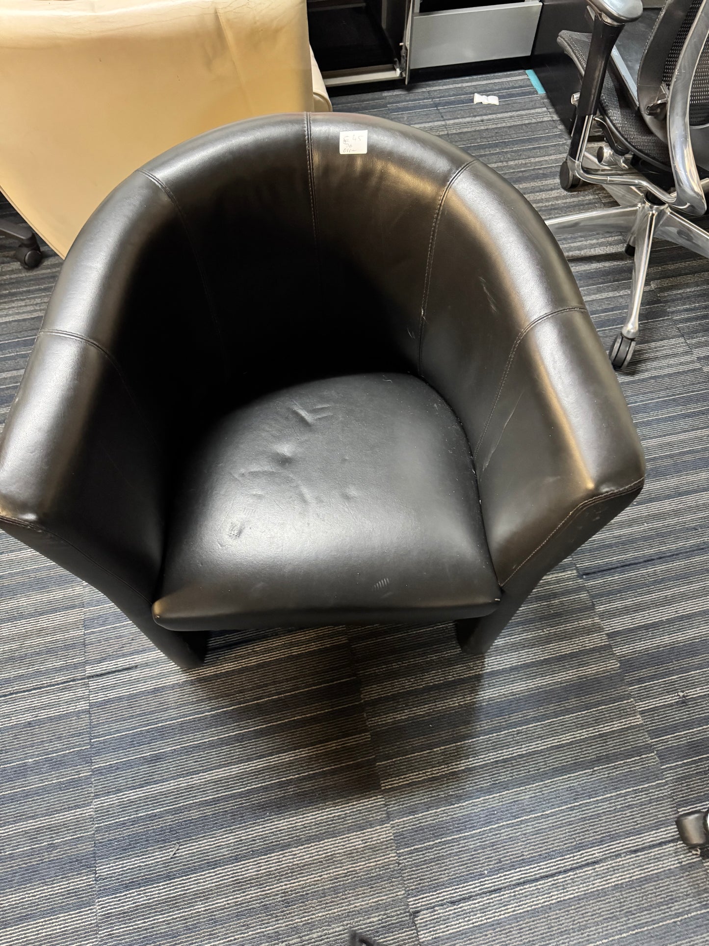 Used leather armchair in black