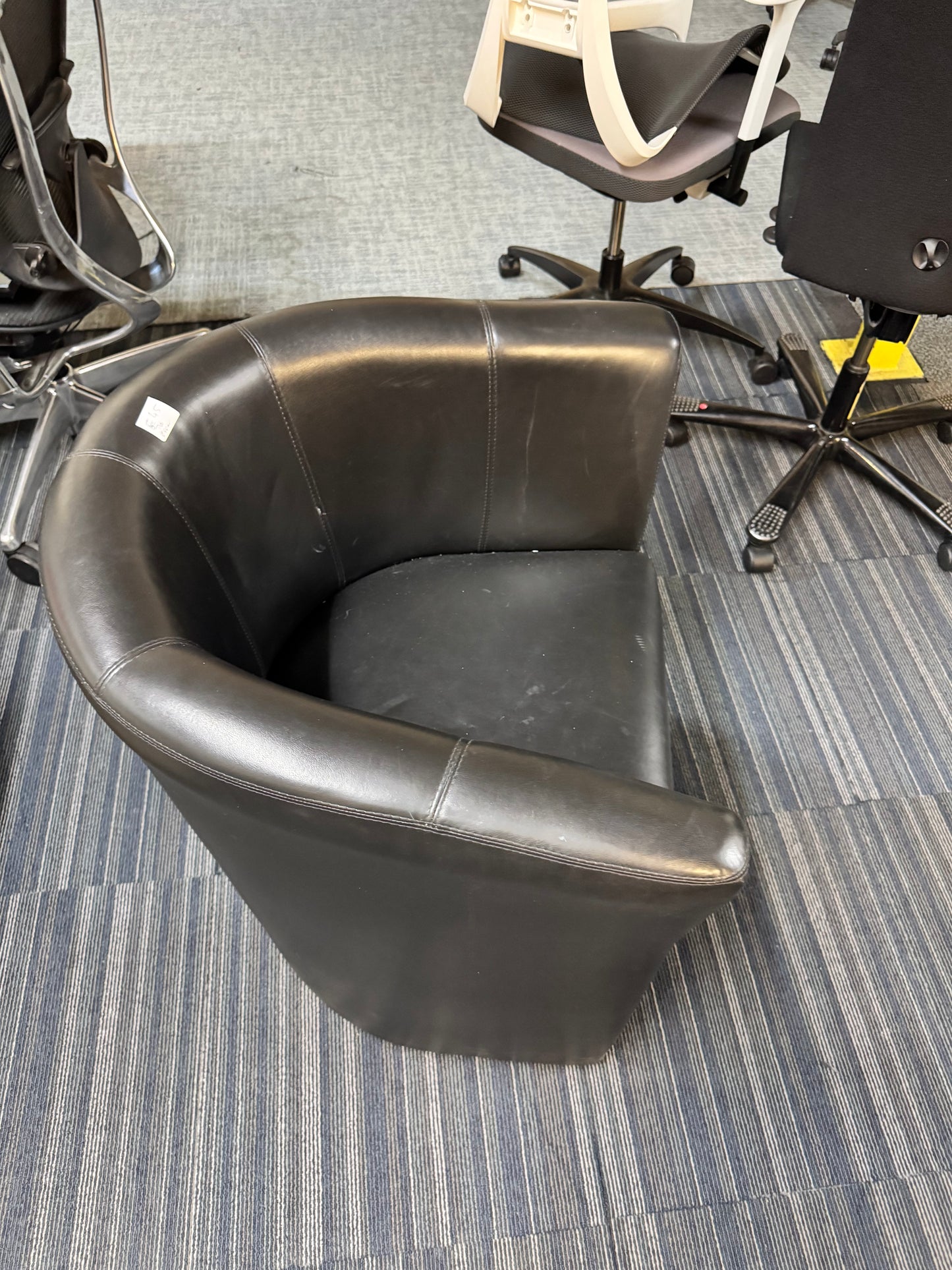 Used leather armchair in black