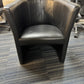 Used leather armchair in black