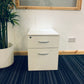 Under drawer cabinet in white on blue carpet