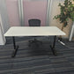 Ikea bekant office desk, with black chair behind