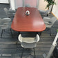 Conference Table with six chairs around in front of dividers