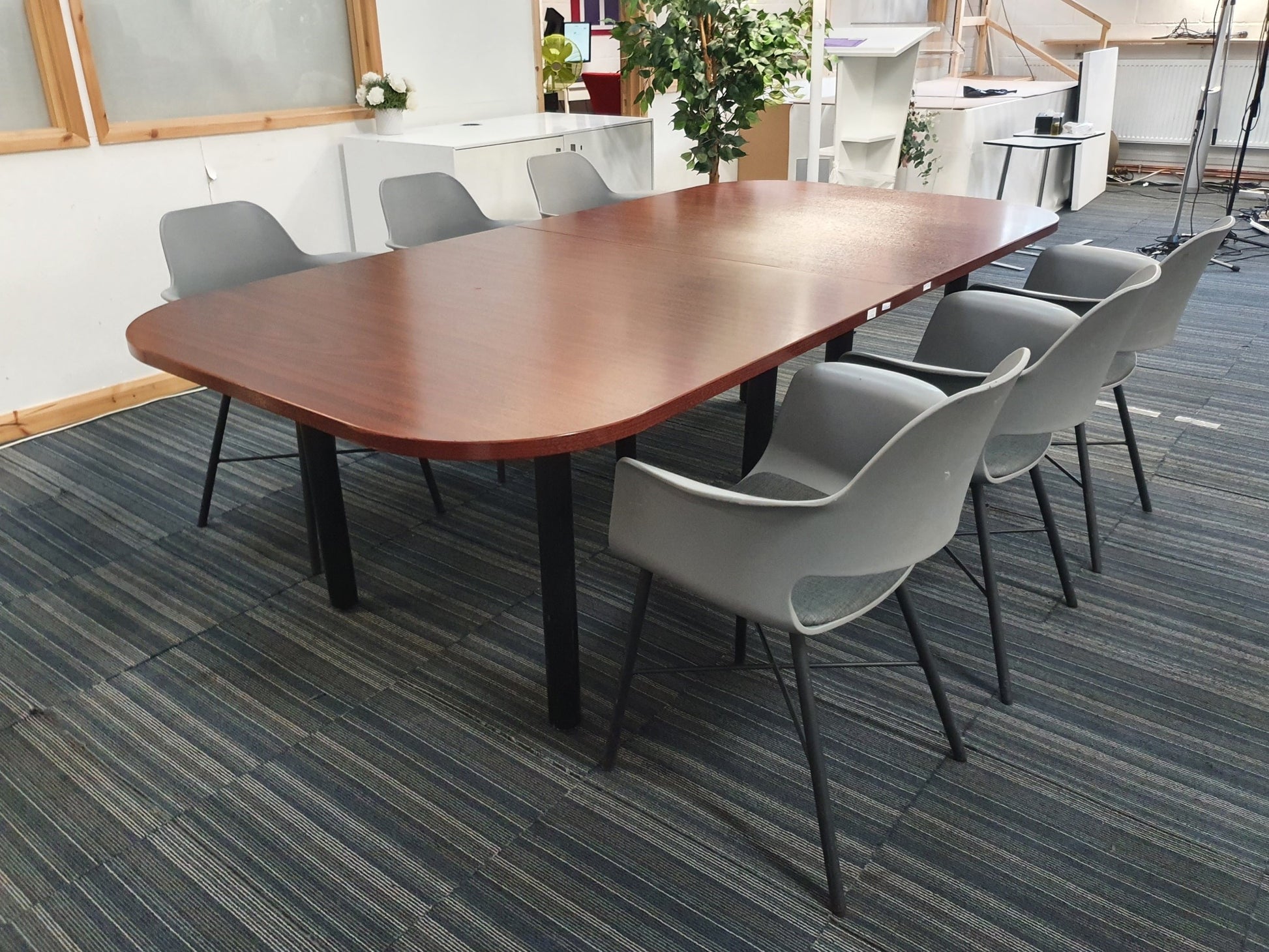 Brown Office Table with six grey chairs