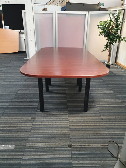 Clear meeting table in front of a divider