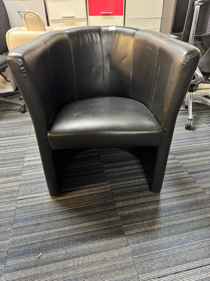 Used leather armchair in black