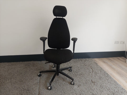 Black swivel desk chair with headrest