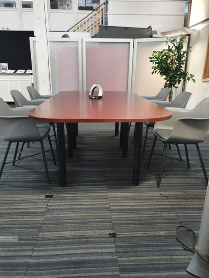 Office Meeting Table black legs and six grey chairs around it